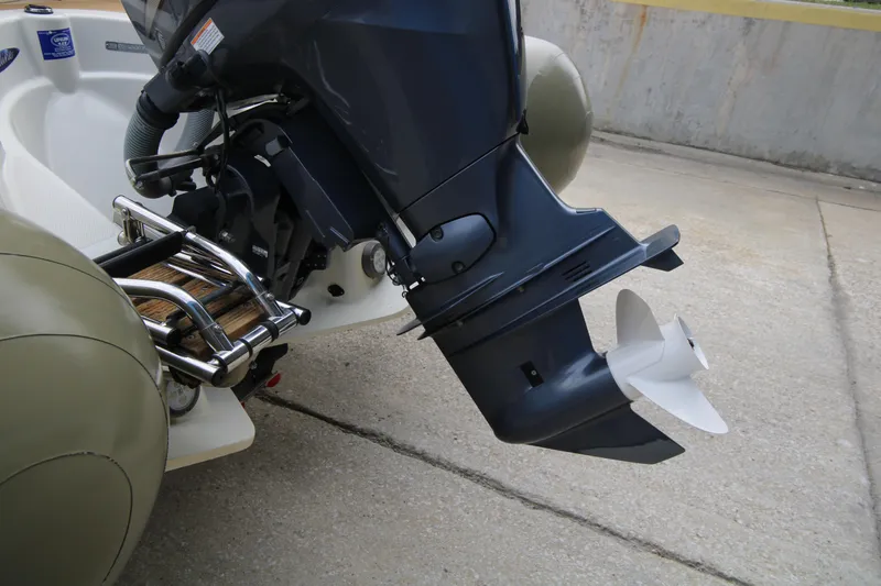 Slide: The Image of 2011 Zodiac Medline 550 NEO boat interior with steering wheel and control panel. - 19