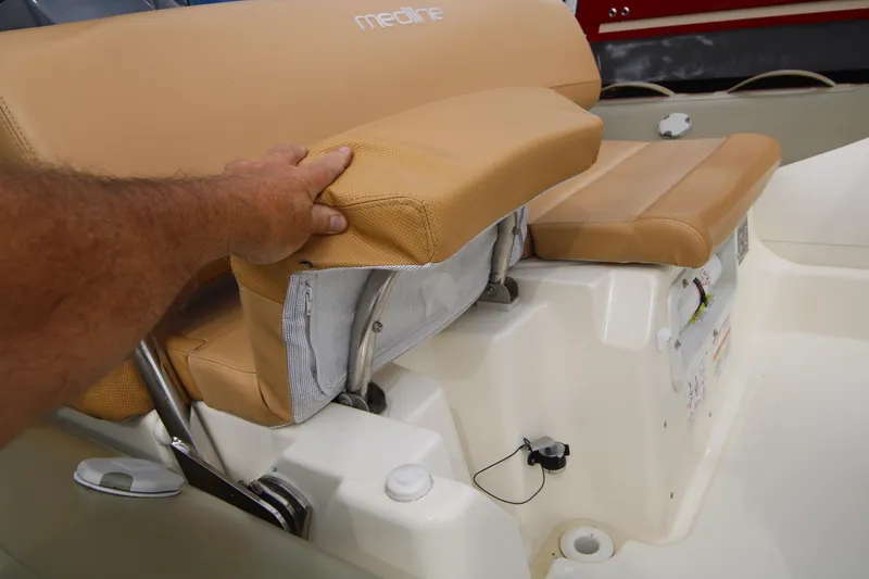 Slide: The Image of Interior view of 2011 Zodiac Medline 550 NEO boat showing seating and storage area. - 28