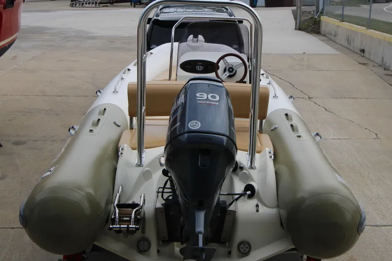Slide: The Image of 2011 Zodiac Medline 550 NEO inflatable boat with Yamaha 90 engine on trailer. - 5