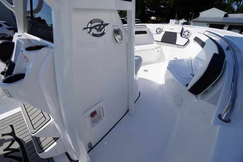 Slide: The Image of 2026 Tidewater 220 LXF boat interior with seating and cup holders. - 28