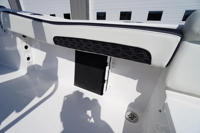Slide: The Image of 2026 Tidewater 220 LXF boat interior detail with sleek seating and modern design. - 39