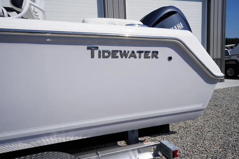 Slide: The Image of 2026 Tidewater 220 LXF boat side view with Yamaha engine. - 4