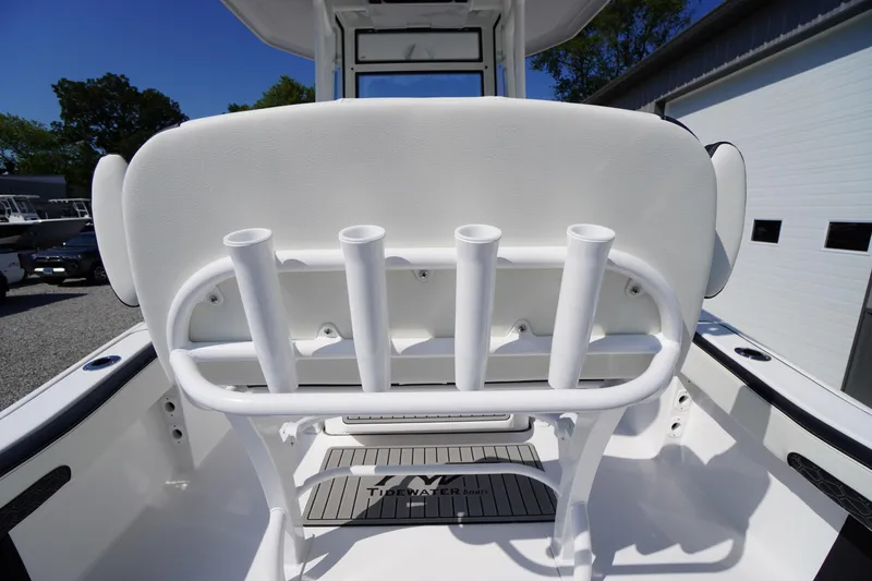 Slide: The Image of 2026 Tidewater 220 LXF boat interior with rod holders and seating. - 50