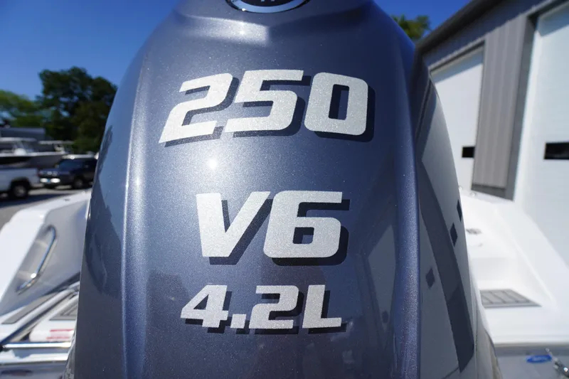 Slide: The Image of Close-up of 250 V6 4.2L engine on 2026 Tidewater 220 LXF boat. - 63