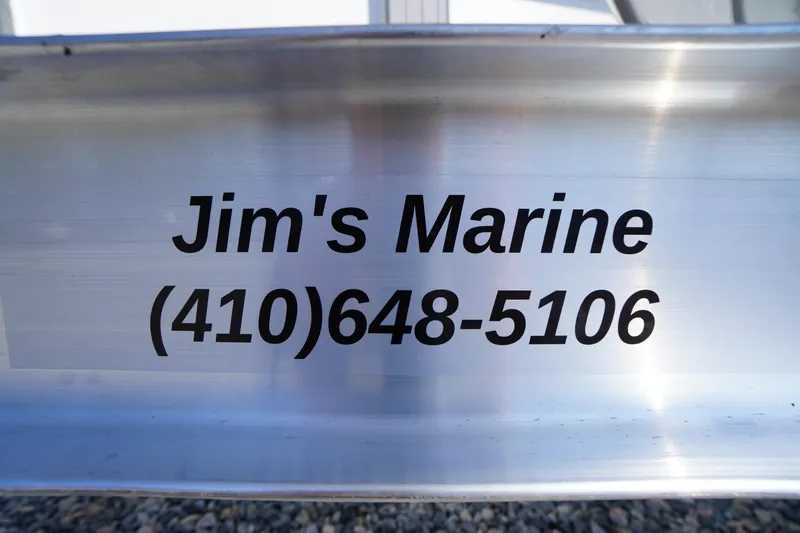 Slide: The Image of Jim's Marine contact information on Tidewater 220 LXF boat, 2026 model. - 67