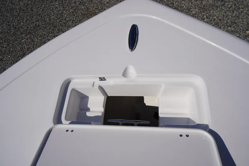 Slide: The Image of Bow storage compartment on 2026 Tidewater 220 LXF boat, featuring sleek design and functionality. - 8