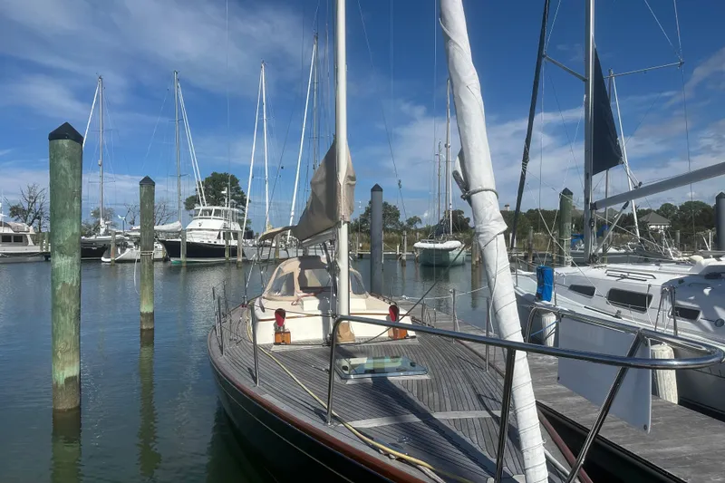 Slide: The Image of Sailboat docked at marina, Morris M36, 2006 model, under clear blue sky. - 31