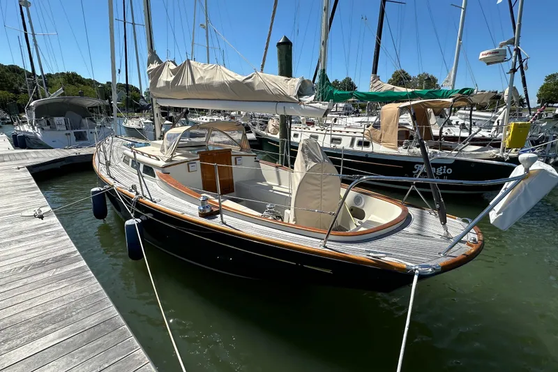 Slide: The Image of Sailboat docked at marina, Morris M36, 2006 model, sunny day, calm waters. - 7