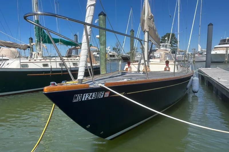 Slide: The Image of Sailboat docked in marina, Morris M36, 2006 model, clear blue sky. - 8