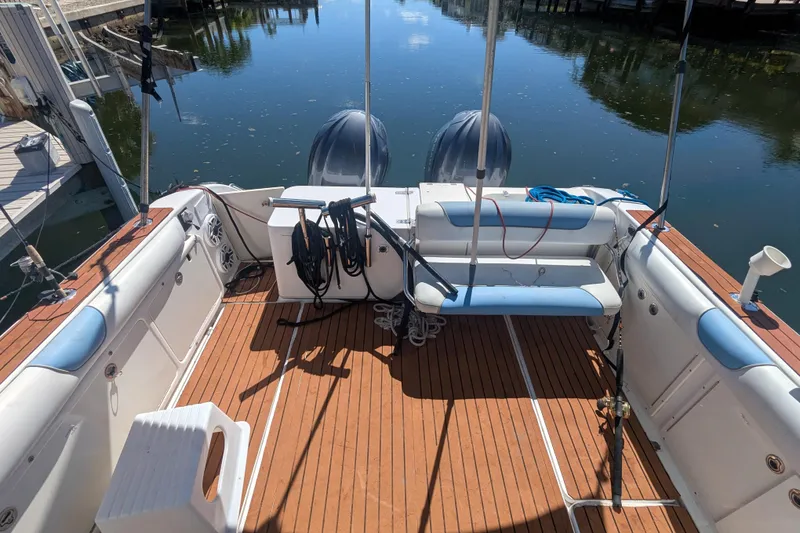 Slide: The Image of 2008 Century 3200 Offshore boat with spacious deck and dual engines. - 10