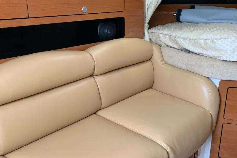 Slide: The Image of Luxurious beige leather seating in 2008 Century 3200 Offshore cabin interior. - 16