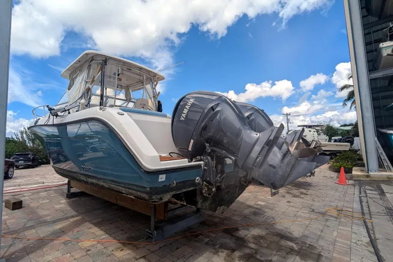 Slide: The Image of 2008 Century 3200 Offshore boat with Yamaha engines on a sunny day. - 2