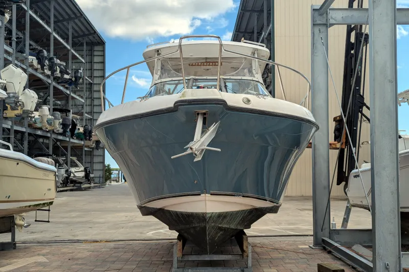 Slide: The Image of 2008 Century 3200 Offshore boat in storage facility, front view. - 5