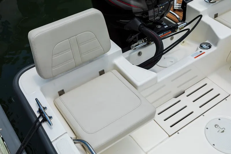 Slide: The Image of Manufacturer Provided Image: 2019 Boston Whaler 170 Montauk boat seat and engine area. - 25