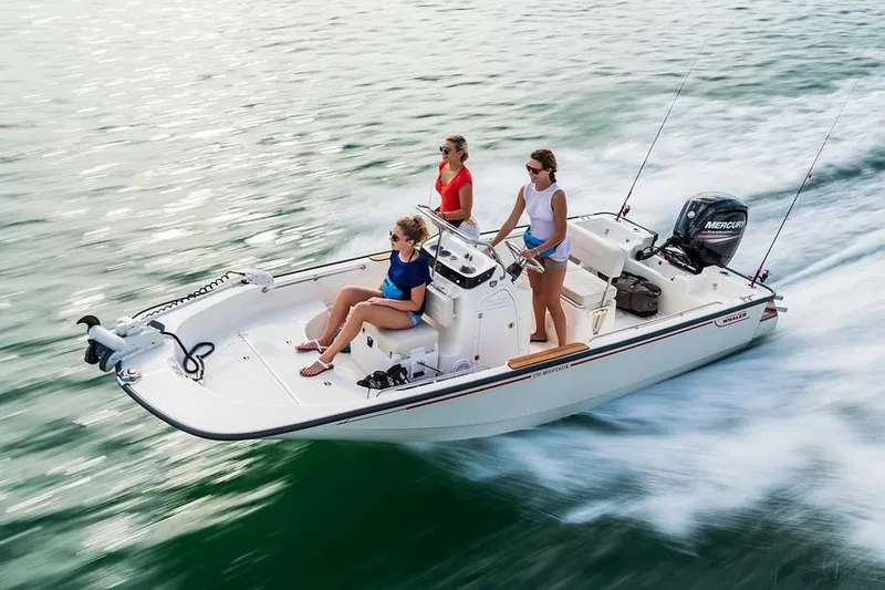 Slide: The Image of Manufacturer Provided Image: 2019 Boston Whaler 170 Montauk boat cruising with three passengers. - 5