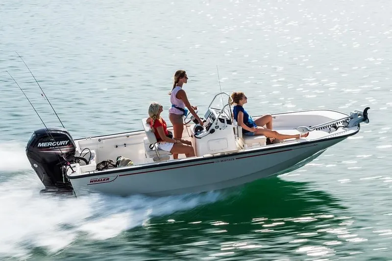 Slide: The Image of Manufacturer Provided Image: 2019 Boston Whaler 170 Montauk boat cruising on water with three passengers. - 7