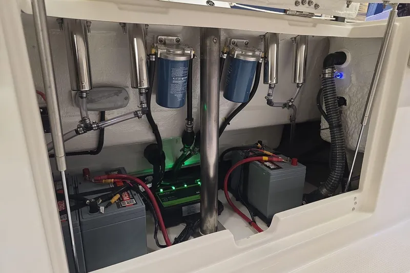 Slide: The Image of Electrical and mechanical components inside a 2026 Sailfish 252 CC boat. - 10