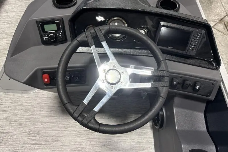 Slide: The Image of Steering console of 2026 Bennington 23 SSRSF boat with modern controls and display. - 21