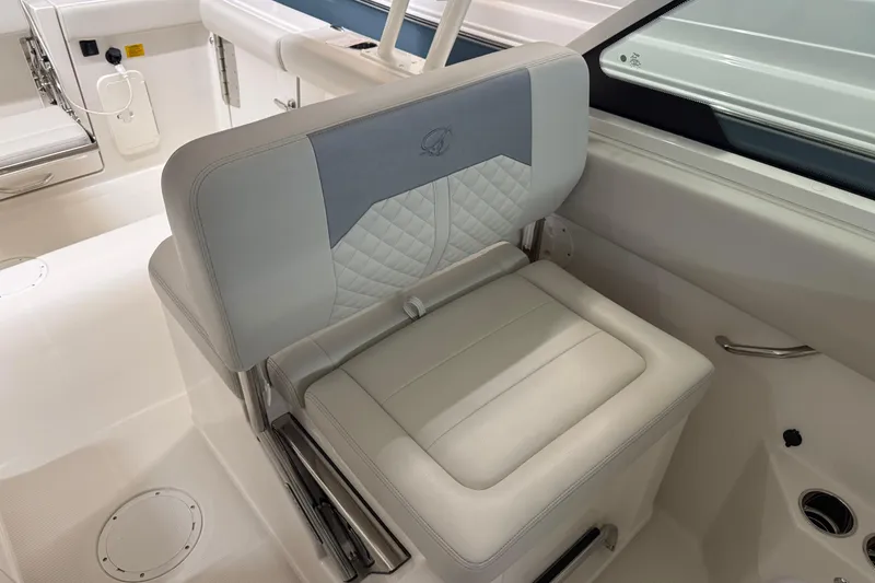 Slide: The Image of Luxurious seating on 2026 Sailfish 276 DC boat, featuring elegant upholstery and modern design. - 13