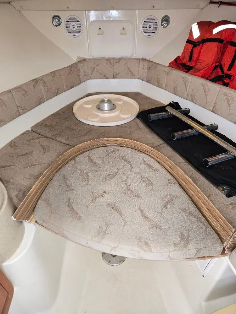 Slide: The Image of 2005 Hydra-Sports Vector 2500 VX cabin interior with seating and life jackets. - 17