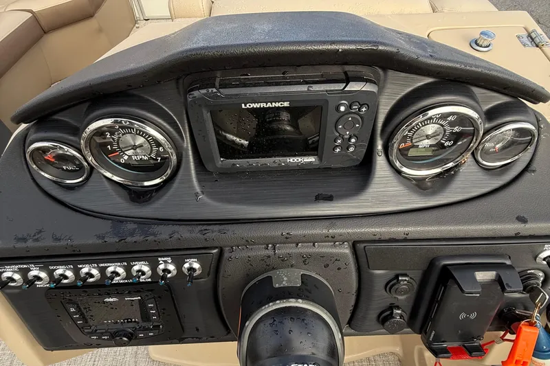 Slide: The Image of Dashboard of 2025 Berkshire 22CL CTS boat with gauges and navigation system. - 13