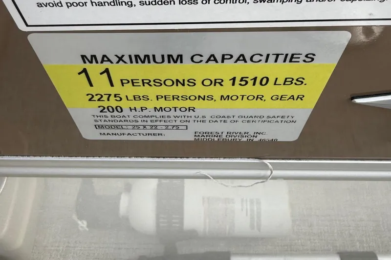 Slide: The Image of Maximum capacity label for 2025 Berkshire 22CL CTS boat: 11 persons or 1510 lbs. - 17