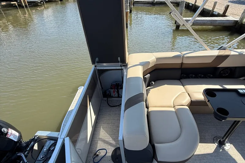 Slide: The Image of 2025 Berkshire 22CL CTS pontoon boat for sale, displayed on a trailer. - 6