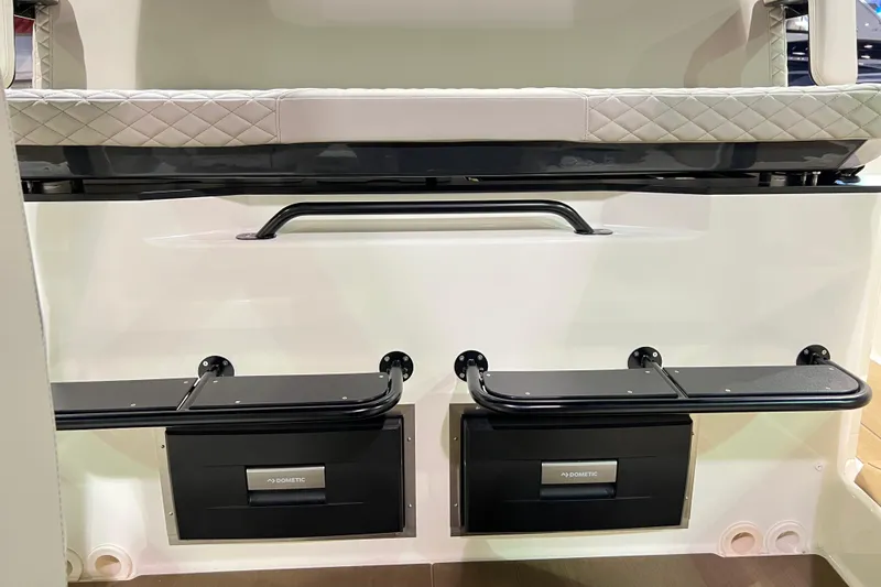 Slide: The Image of Interior of 2026 Navan S30 boat with seating and storage compartments. - 10