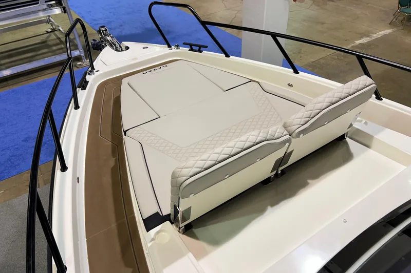Slide: The Image of 2026 Navan S30 boat interior with cushioned seating and sleek design. - 12