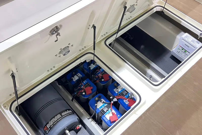 Slide: The Image of Electrical compartment of 2026 Navan S30 with batteries and marine equipment. - 16