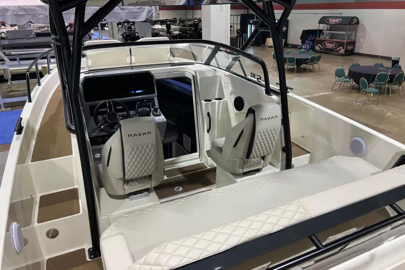 Slide: The Image of Interior view of 2026 Navan S30 boat with modern seating and control panel. - 6