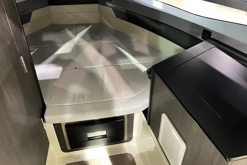 Slide: The Image of Interior of 2026 Navan S30 boat with modern cabin design and comfortable seating. - 9