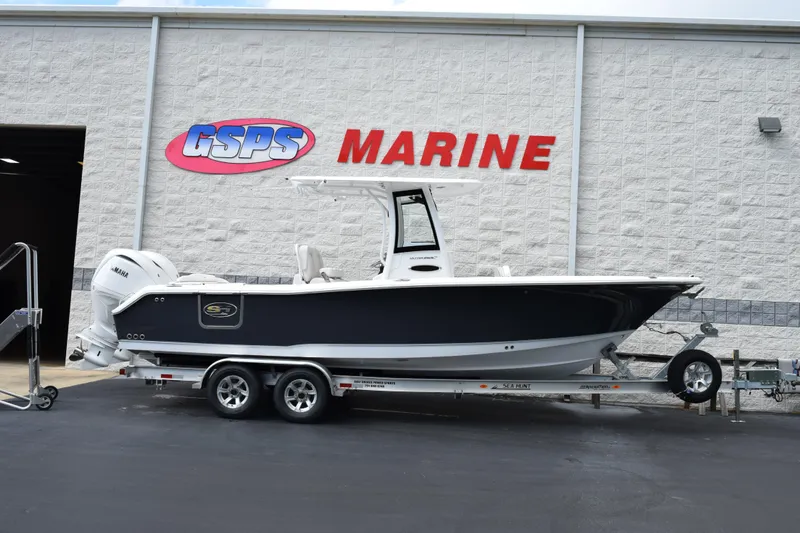 The Image of 2026 Sea Hunt Ultra 265 SE boat on trailer at GSPS Marine dealership. - 1