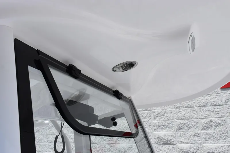 Slide: The Image of 2026 Sea Hunt Gamefish 27 Forward Seating boat windshield and roof detail. - 15