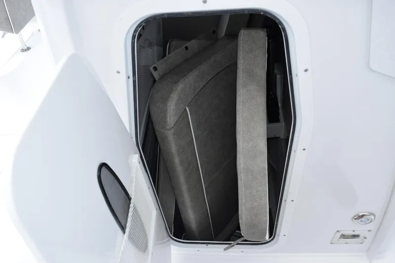 Slide: The Image of Storage compartment in 2026 Sea Hunt Gamefish 27 Forward Seating boat. - 17