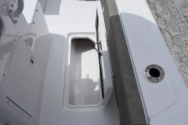 Slide: The Image of 2026 Sea Hunt Gamefish 27 Forward Seating boat storage compartment and seating area. - 20