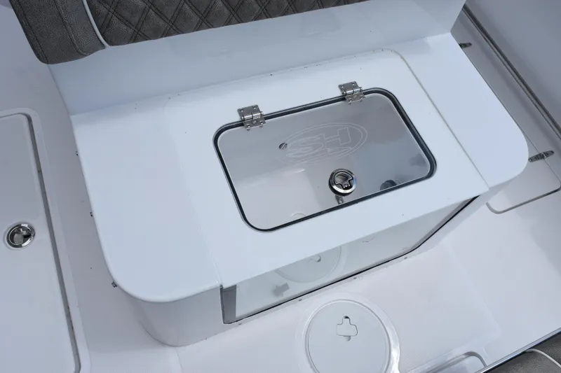 Slide: The Image of 2026 Sea Hunt Gamefish 27 Forward Seating livewell with transparent lid and secure latch. - 23