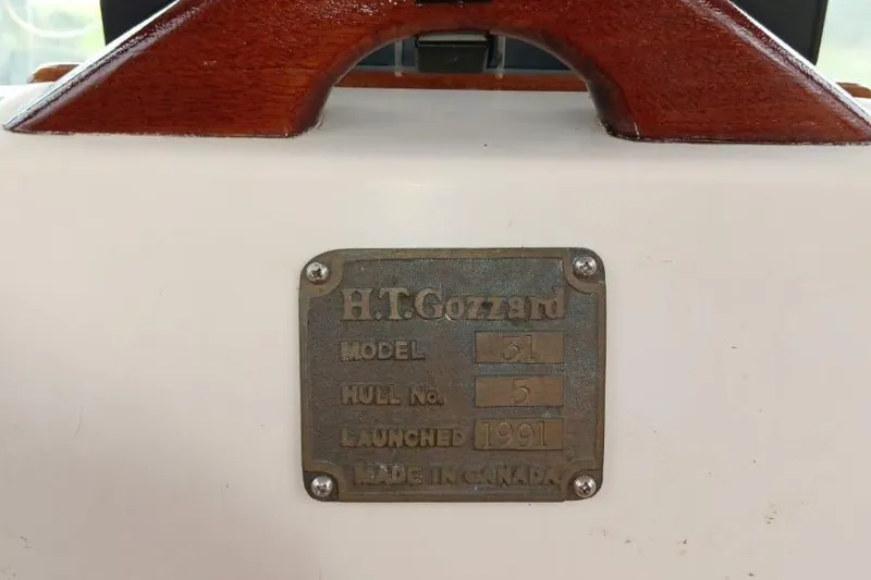 Slide: The Image of Plaque on Gozzard 31 sailboat, launched in 1991, made in Canada. - 54