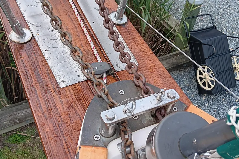 Slide: The Image of Anchor chain and deck details of a 1991 Gozzard 31 sailboat. - 7