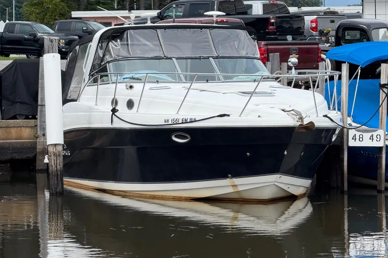 The Image of 2006 Rinker Fiesta Vee 342 docked at marina, front view. - 0