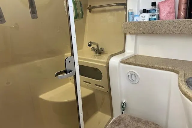 Slide: The Image of Bathroom interior of 2006 Rinker Fiesta Vee 342 yacht with shower and sink. - 14