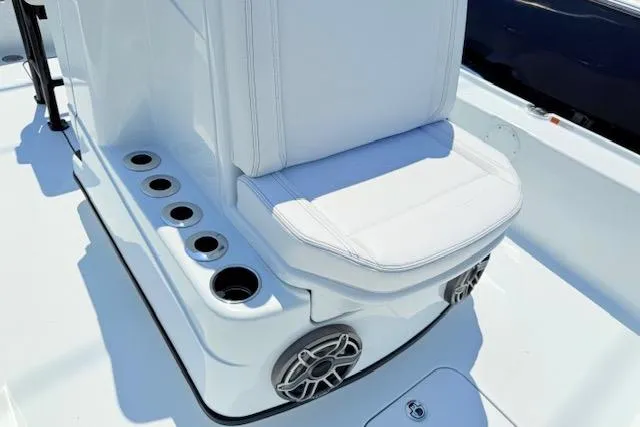 Slide: The Image of Open storage compartment on 2026 Yellowfin 24 Bay CE boat. - 10