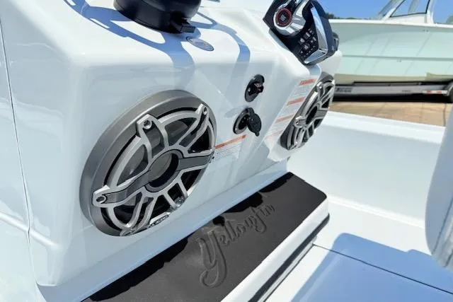 Slide: The Image of 2026 Yellowfin 24 Bay CE boat deck with storage compartments. - 6