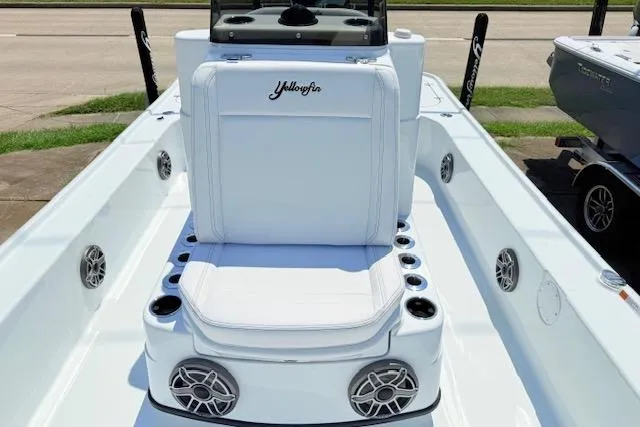 Slide: The Image of 2026 Yellowfin 24 Bay CE boat seat with cup holders and speakers. - 9