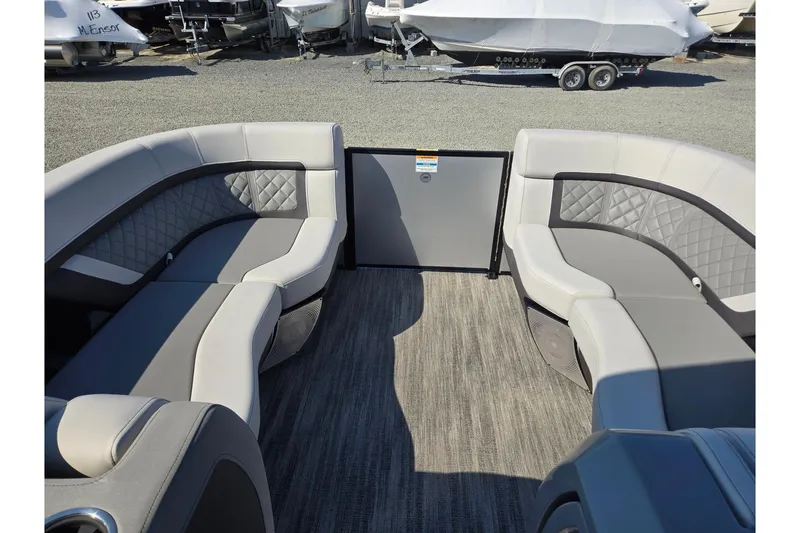 Slide: The Image of 2026 Godfrey AquaPatio 255 SFL boat interior with luxurious seating and modern design. - 34