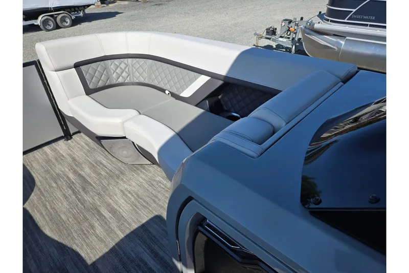 Slide: The Image of Luxurious seating on 2026 Godfrey AquaPatio 255 SFL pontoon boat, featuring modern design and comfort. - 36