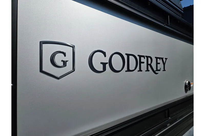 Slide: The Image of Godfrey AquaPatio 255 SFL 2026 model logo on sleek metallic surface. - 38