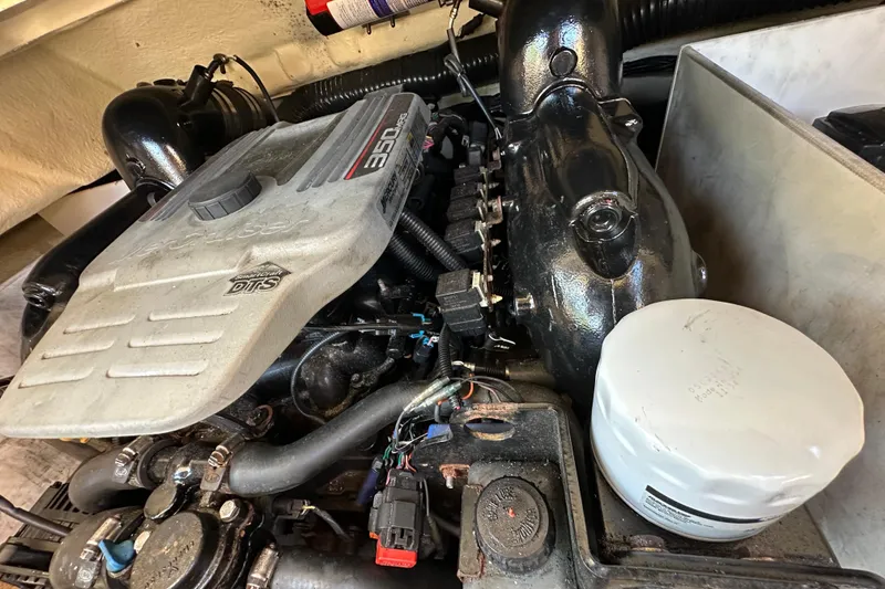 Slide: The Image of Engine of a 2015 Sea Ray 230 SLX boat, showcasing detailed components. - 20