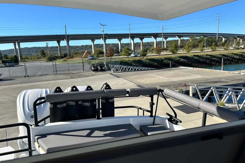 Slide: The Image of Teak deck detail on 2025 Sargo 31OB boat, showcasing elegant wood finish. - 12