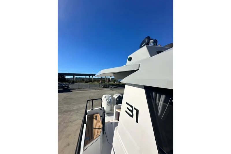 Slide: The Image of 2025 Sargo 31OB boat deck with seating, showcasing modern design and outdoor space. - 4